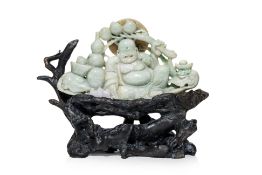 A CARVED JADEITE MODEL OF BUDAI