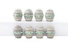 A GROUP OF EIGHT JOANNA BUCHANAN SPARKLE EGG PLACE CARD HOLDERS (8)