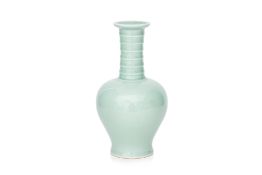A CELADON-GLAZED BOTTLE VASE WITH RIBBED NECK