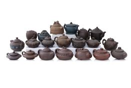 A GROUP OF 20 YIXING ZISHA TEAPOTS