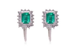 A PAIR OF EMERALD AND DIAMOND SCREW-ON EARRINGS