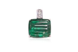 AN EMERALD AND DIAMOND PENDANT