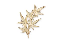 A DIAMOND AND TEXTURED GOLD 'LEAF' BROOCH