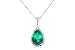 A LARGE COLOMBIAN EMERALD AND DIAMOND PENDANT ON CHAIN