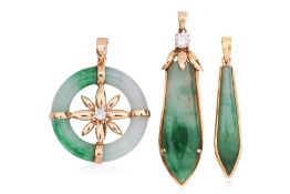A GROUP OF THREE JADE PENDANTS