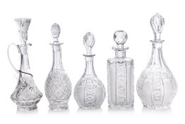 A GROUP OF FIVE CUT CRYSTAL DECANTERS