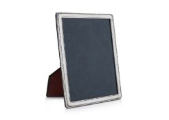 A LARGE ENGLISH STERLING SILVER PHOTOGRAPH FRAME