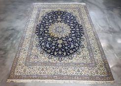 A LARGE PERSIAN NAIN WOOL RUG (425 x 305CM)