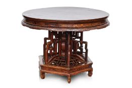 A CHINESE ELM CIRCULAR OCCASIONAL TABLE