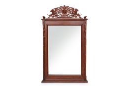 A TEAK FRAMED MIRROR