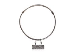 A SILVER TORQUE NECKLACE WITH AN AMULET BOX PENDANT