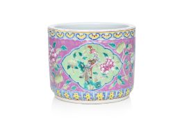 A FAMILLE ROSE PINK GROUND PHOENIX AND PEONY JOSS STICK HOLDER