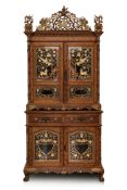 AN IMPRESSIVE CARVED AND PARCEL-GILT TEAK CABINET