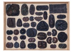 A COLLECTION OF COPPER JEWELLERY MAKING MOULDS