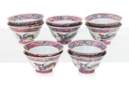 A NEAR SET OF 10 FAMILLE ROSE PHOENIX AND PEONY TEA BOWLS