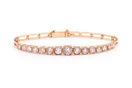 A GOLD AND DIAMOND BRACELET