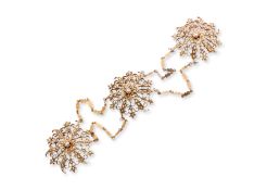 A SILVER-GILT AND PEARL INSET KEROSANG BROOCH