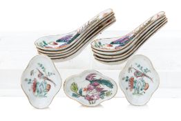 A GROUP OF 13 FAMILLE ROSE BIRD AND FLOWER SPOONS AND SAUCE DISHES