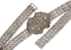A SILVER BELT AND BUCKLE