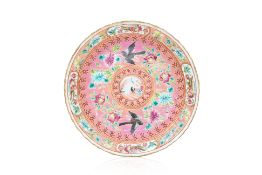 A PINK GROUND FAMILLE ROSE SAUCER
