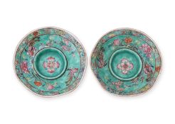 A PAIR OF FAMILLE ROSE GREEN GROUND CUP STANDS