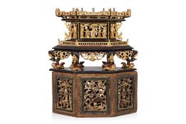A LACQUERED AND PARCEL-GILT CARVED WOOD CHANAB