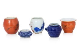 A GROUP OF FIVE PORCELAIN BIRD FEEDERS