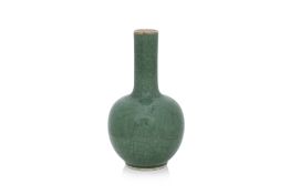 A GREEN CRACKLE-GLAZED BOTTLE VASE