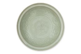 A LONGQUAN CELADON MOULDED DRAGON DISH