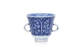 A BLUE AND WHITE TWIN-HANDLED CHOCOLATE CUP