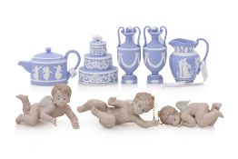 A GROUP OF WEDGWOOD BLUE JASPERWARE AND LLADRO CHRISTMAS TREE DECORATIONS (8)