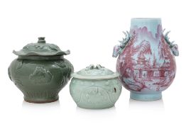 TWO CELADON-GLAZED LIDDED JARS AND A HU-FORM VASE