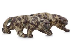 A PAIR OF ROYAL COPENHAGEN STONEWARE PANTHERS DESIGNED BY KNUD KHYN