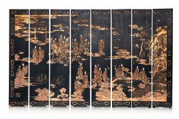 AN EIGHT PANEL GILT AND LACQUER SCREEN
