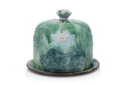A JOSEPH HOLDCROFT MAJOLICA LILY POND CHEESE DOME AND STAND