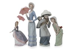 A GROUP OF FOUR LLADRO FIGURES OF LADIES
