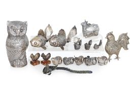 A GROUP OF SILVER AND METAL ANIMALS (16)