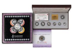 SINGAPORE, TWO 2010 YOUTH OLYMPICS COINS AND A 1994 STERLING SILVER COIN SET (3)