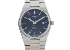 A TISSOT PRX STAINLESS STEEL BRACELET WATCH