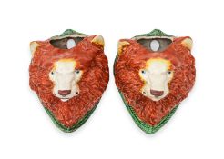 A PAIR OF JAPANESE PORCELAIN BEAR WALL POCKETS