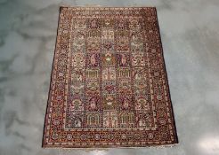 A PERSIAN SILK RUG OF PANELED DESIGN (148 x 100CM)