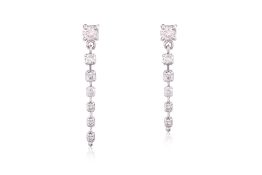 A PAIR OF DIAMOND DROP EARRINGS