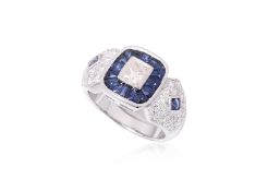 A DIAMOND AND SAPPHIRE RING