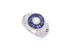 A DIAMOND AND SAPPHIRE RING
