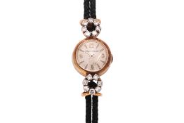 A JAEGER LE COULTRE LADIES GOLD AND DIAMOND COCKTAIL WATCH