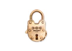 A GOLD LOCK PENDANT BY HOORSENBUHS