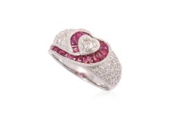 A HEART SHAPED DIAMOND AND RUBY RING
