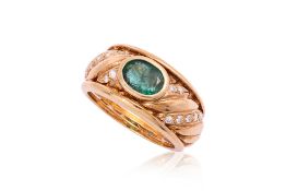 AN EMERALD AND DIAMOND RING