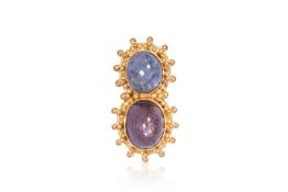 A SAPPHIRE CABOCHON '8' PENDANT