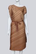 PLEATS PLEASE ISSEY MIYAKE - A BRONZE AND CREAM DIAGONAL STRIPED PLEATED DRESS